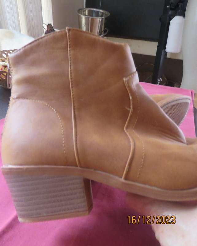 Pair of tan colour ankle boots size 6 by MRP. With comfy cuban heels. Zips at back. New condition