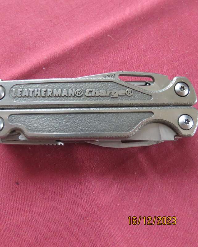 Leatherman Charge multi tool in nylon pouch. New condition.