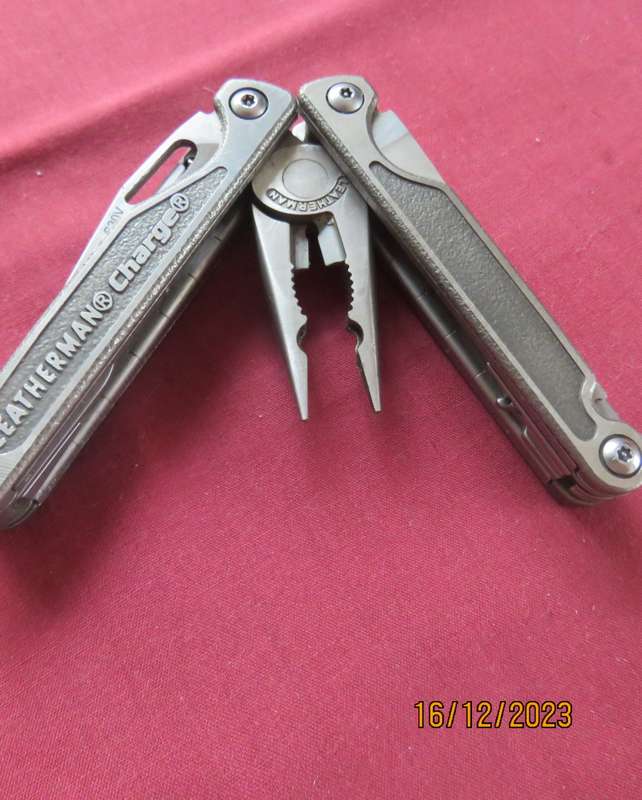 Leatherman Charge multi tool in nylon pouch. New condition.