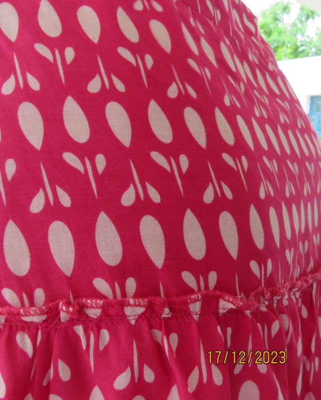 Sweet cheerful Magenta pink/white tiered skirt pulled up om left front. Size 40. By JUDY`S PRIDE.