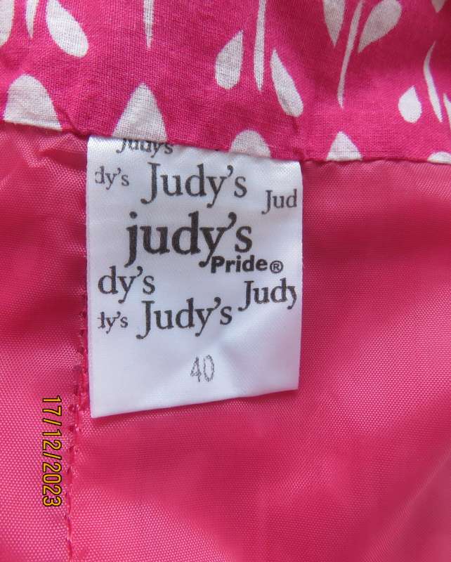 Sweet cheerful Magenta pink/white tiered skirt pulled up om left front. Size 40. By JUDY`S PRIDE.