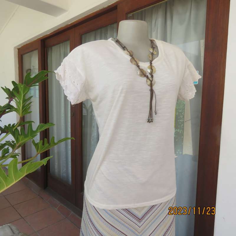 Sweet casual cream slip over polyester stretch top with tiny cut on sleeves/lace.By RED size 36. New