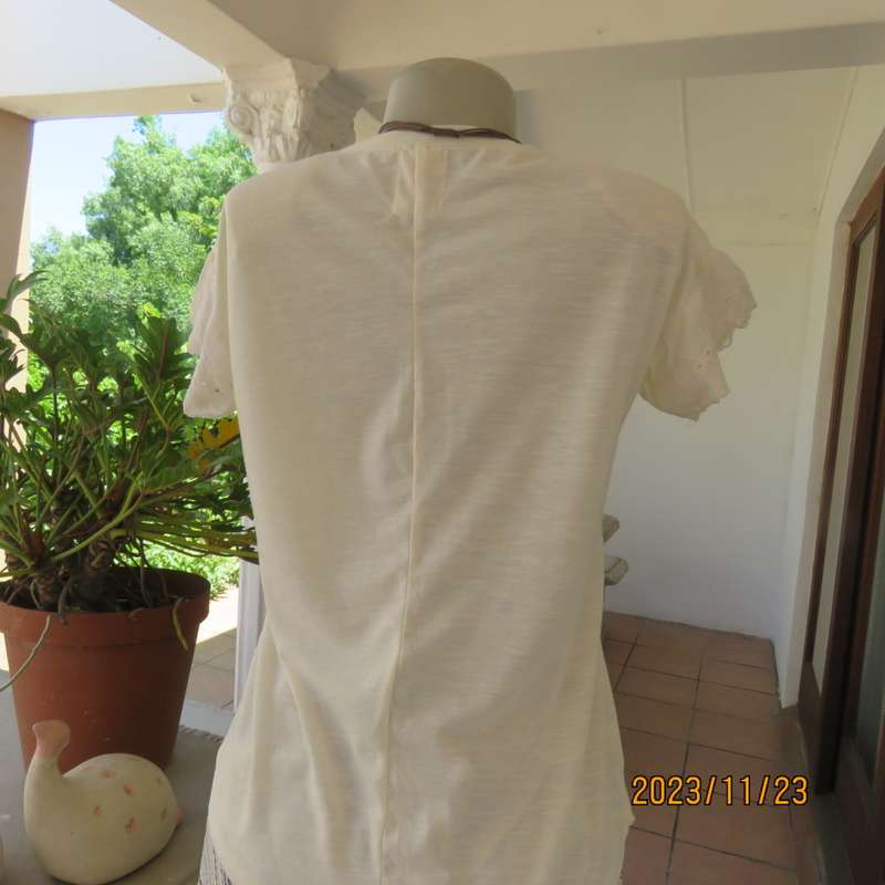 Sweet casual cream slip over polyester stretch top with tiny cut on sleeves/lace.By RED size 36. New