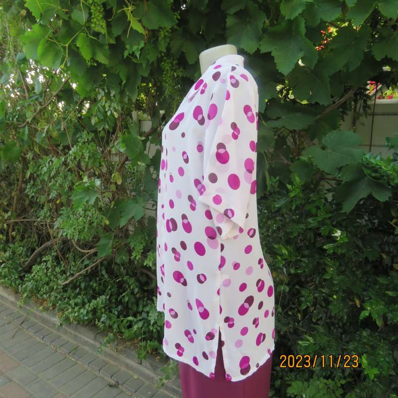 Notice me white sheer polyester short sleeve top with purple dots. Size 42/18.Button down. As new.