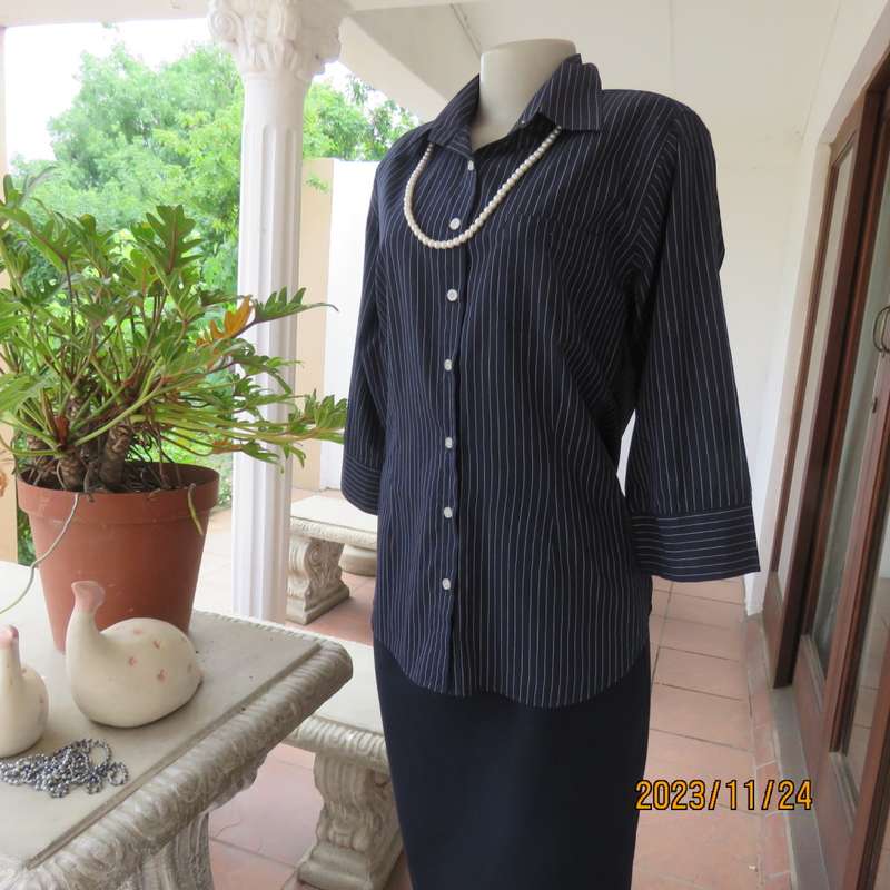 Versatile navy/white pinstripe button down polycotton tailored top. Size 38/14. One pocket. New cond