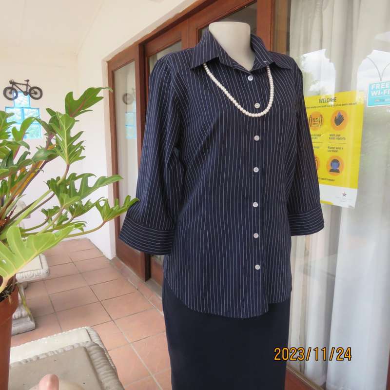 Versatile navy/white pinstripe button down polycotton tailored top. Size 38/14. One pocket. New cond