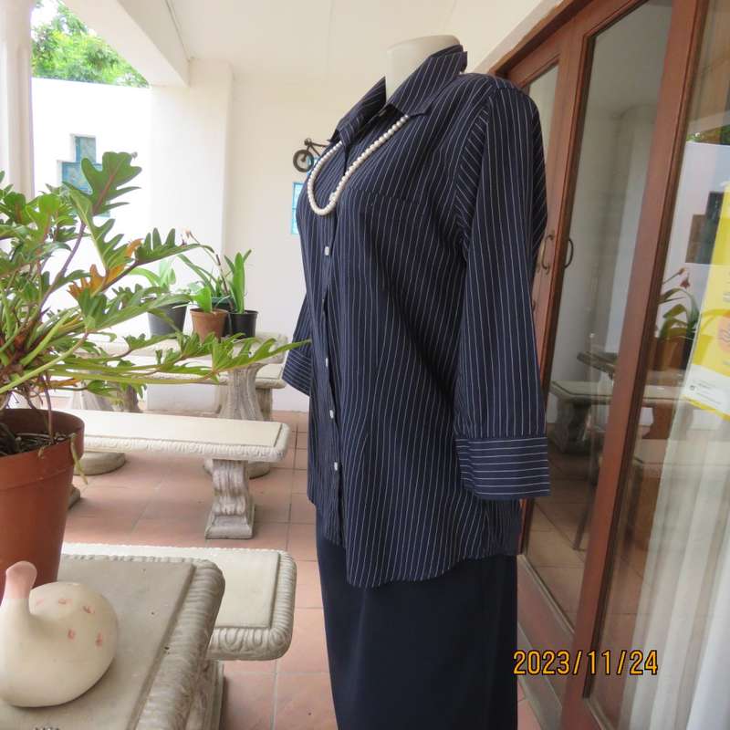 Versatile navy/white pinstripe button down polycotton tailored top. Size 38/14. One pocket. New cond