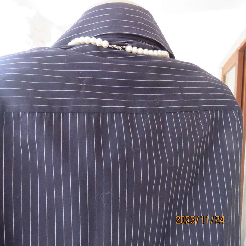 Versatile navy/white pinstripe button down polycotton tailored top. Size 38/14. One pocket. New cond