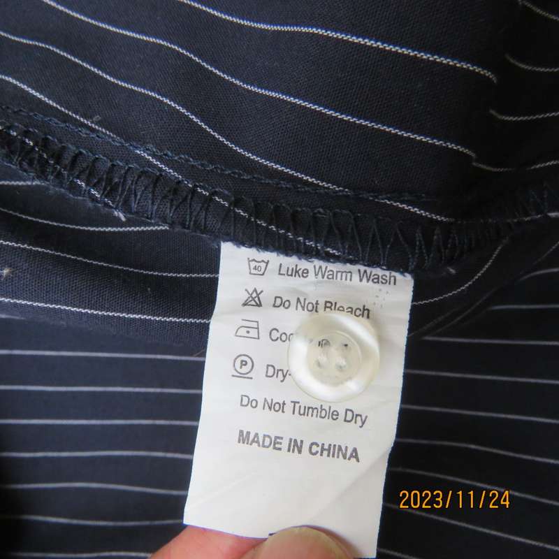 Versatile navy/white pinstripe button down polycotton tailored top. Size 38/14. One pocket. New cond