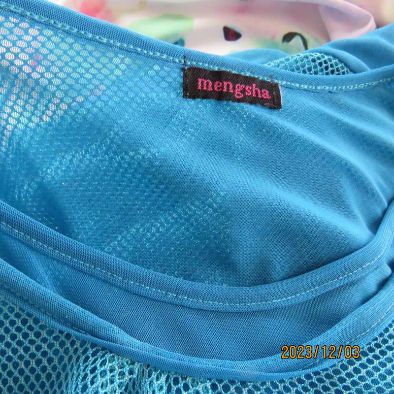 Stunning 2 layer slip over turquoise top by MENGSHA size 36/12. Polyester/nylon. Brand new cond.