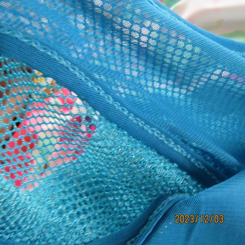 Stunning 2 layer slip over turquoise top by MENGSHA size 36/12. Polyester/nylon. Brand new cond.