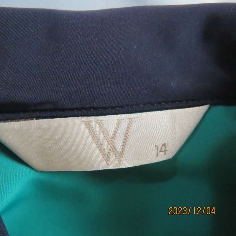 Beautiful jade silky polyester short sleeve top with navy open collar. By WOOLWORTHS size 38. As new