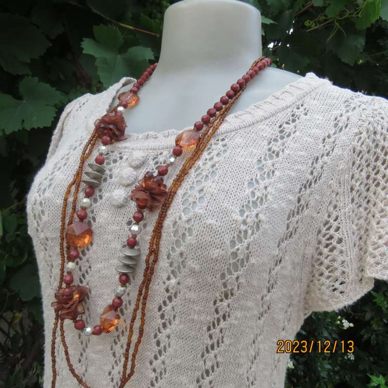 Stunning ecru colour cotton/acrylic/mohair lace knitted capped sleeve top by MACA. Size 36/38.As new
