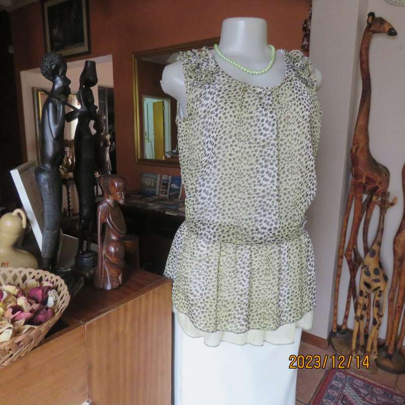 Pretty cool animal  print pale green/black blouson/peplum sheer poly/lined top. Size 36. As new.