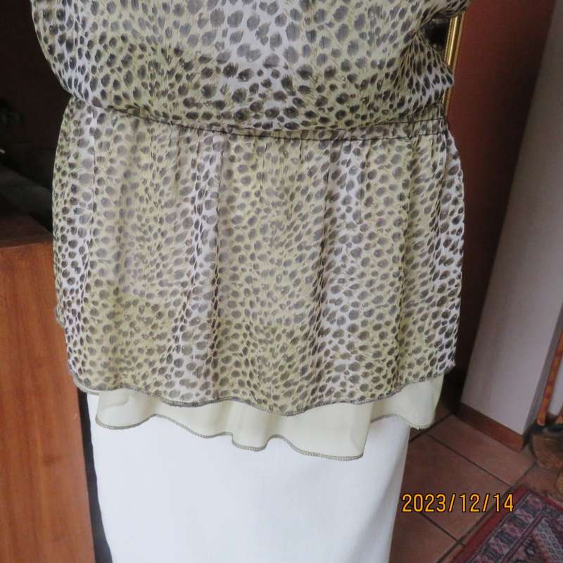 Pretty cool animal  print pale green/black blouson/peplum sheer poly/lined top. Size 36. As new.
