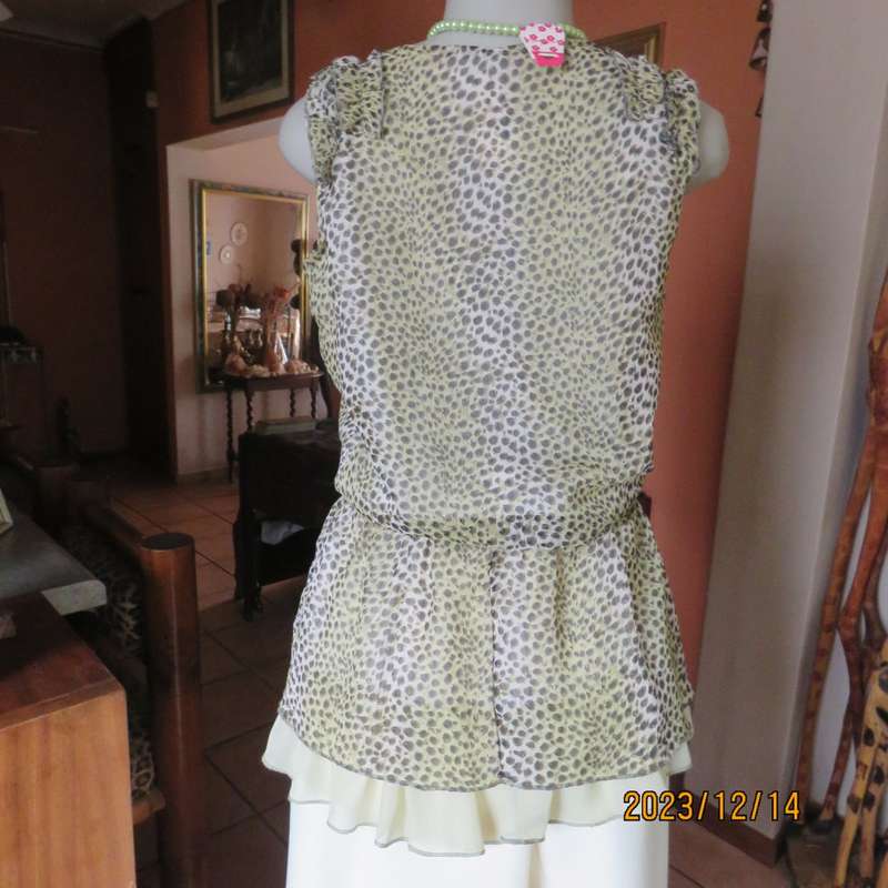 Pretty cool animal  print pale green/black blouson/peplum sheer poly/lined top. Size 36. As new.