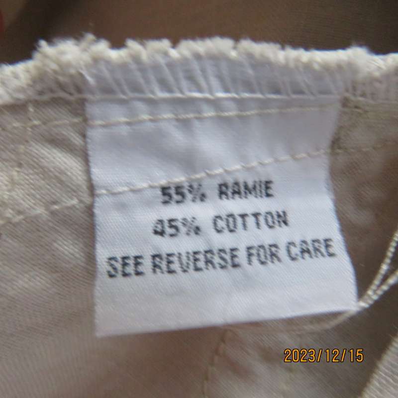 Sweet ecru colour V neck slip over linen/cotton blend top. Lace/ribbon front decoration. Size 34.