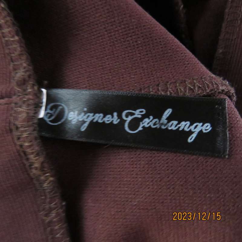 Elegant paneled choc brown ribbed stretch polyester high waisted skirt. By DESIGNER EXC. size 36.