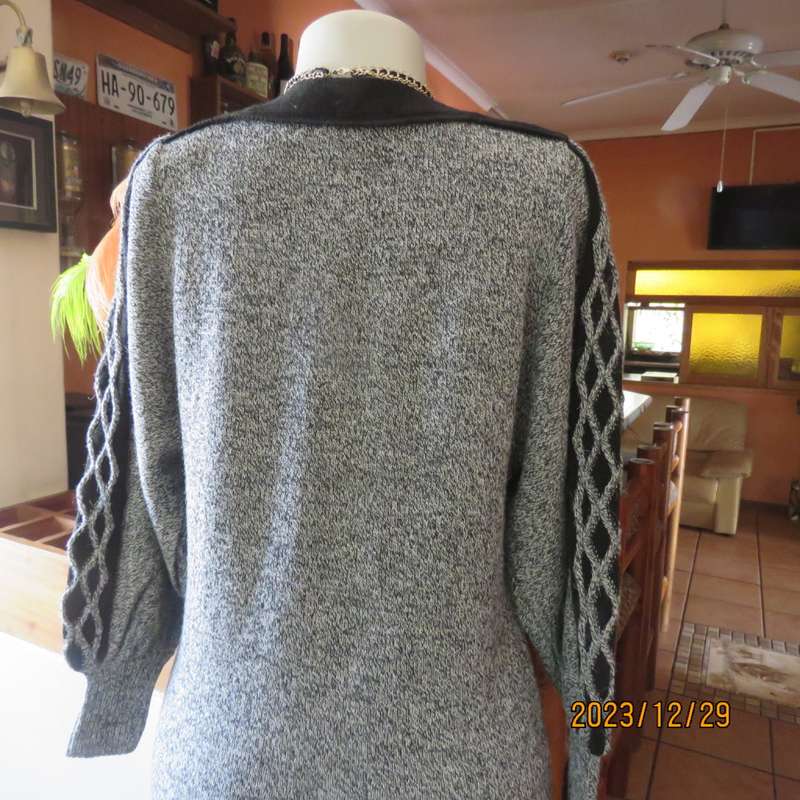 Go for effortless style. Wool/acrylic/cotton blend low calf  knitted dress. By FUJIKI size 34.As new