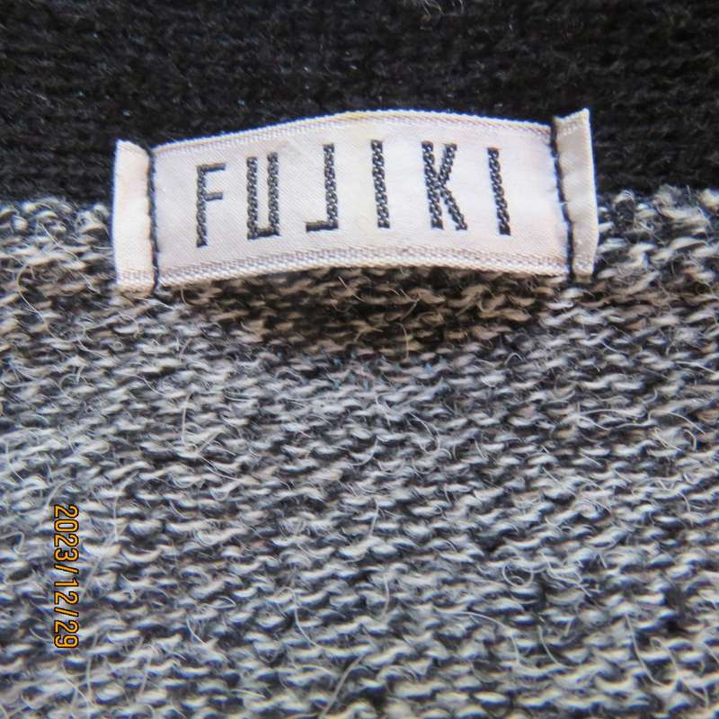 Go for effortless style. Wool/acrylic/cotton blend low calf  knitted dress. By FUJIKI size 34.As new