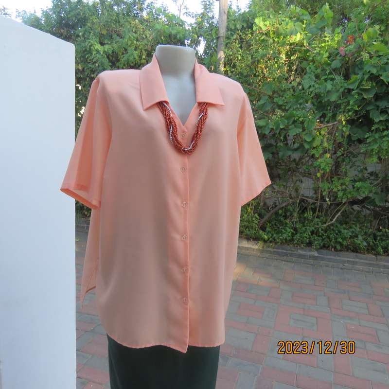 Beautiful soft peach colour button down short sleeve silky polyester top. Size 40 by TOGETHER.As new