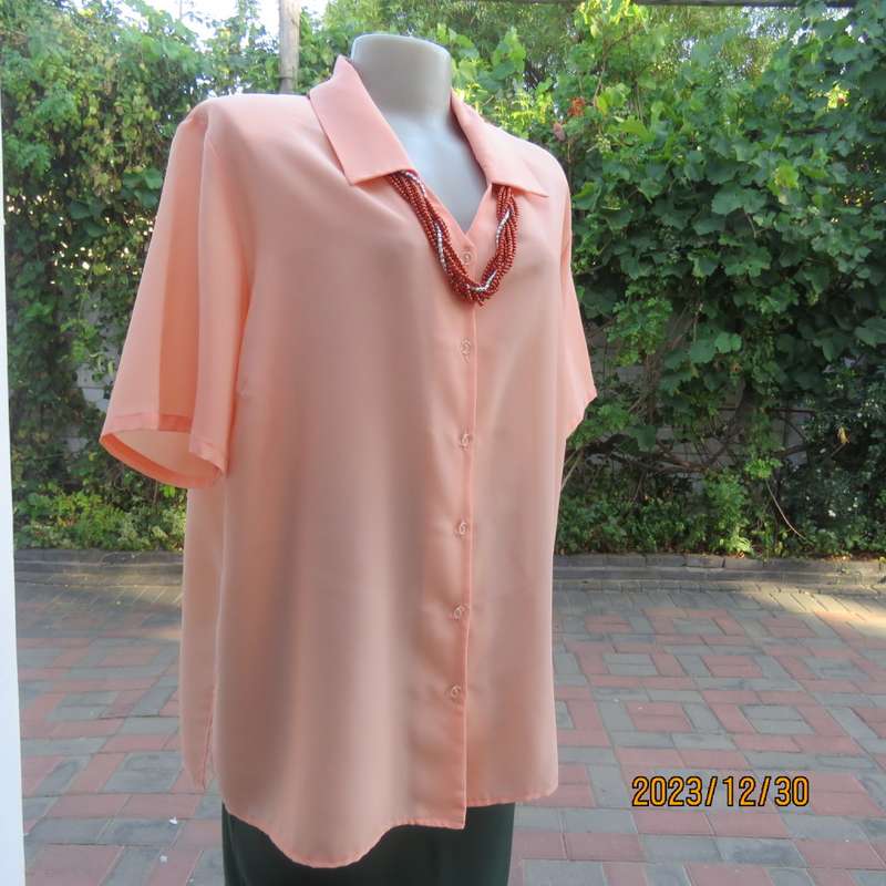 Beautiful soft peach colour button down short sleeve silky polyester top. Size 40 by TOGETHER.As new