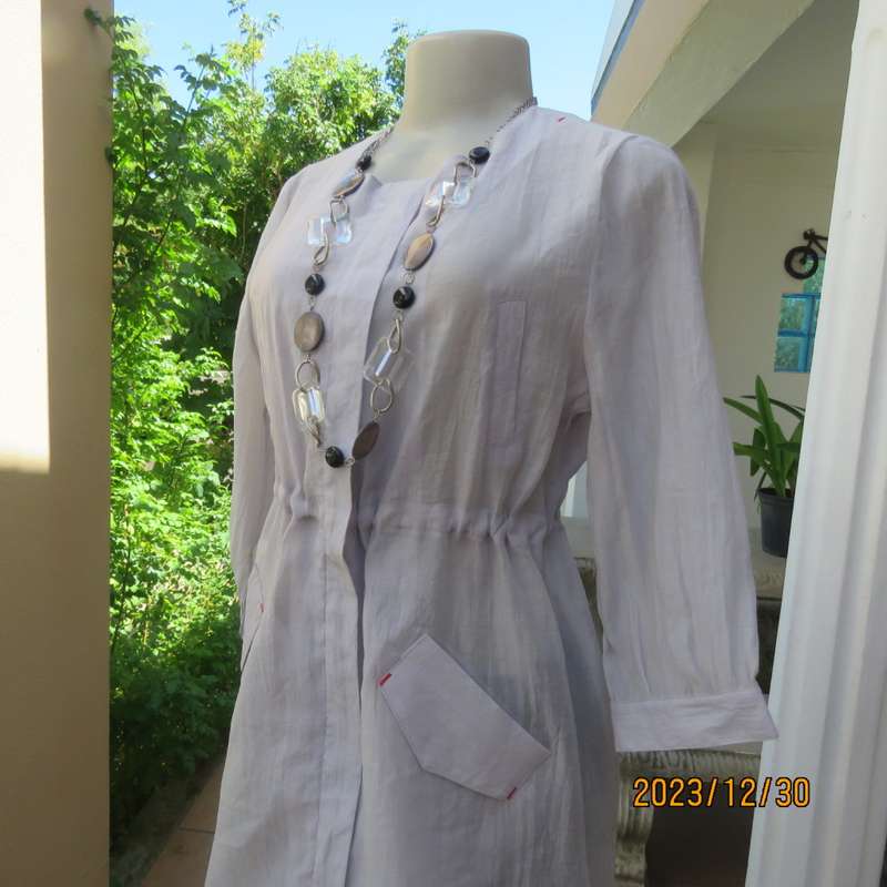 Smart long creased poly/nylon silvergrey zip up top with waist drawstring.From Japan size 36.New con