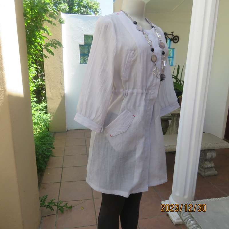 Smart long creased poly/nylon silvergrey zip up top with waist drawstring.From Japan size 36.New con