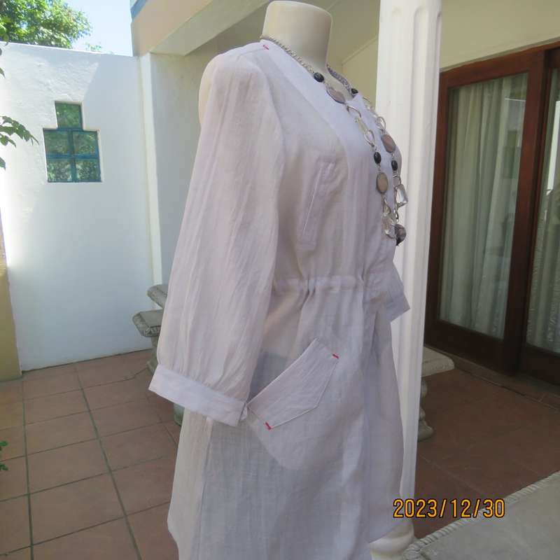 Smart long creased poly/nylon silvergrey zip up top with waist drawstring.From Japan size 36.New con