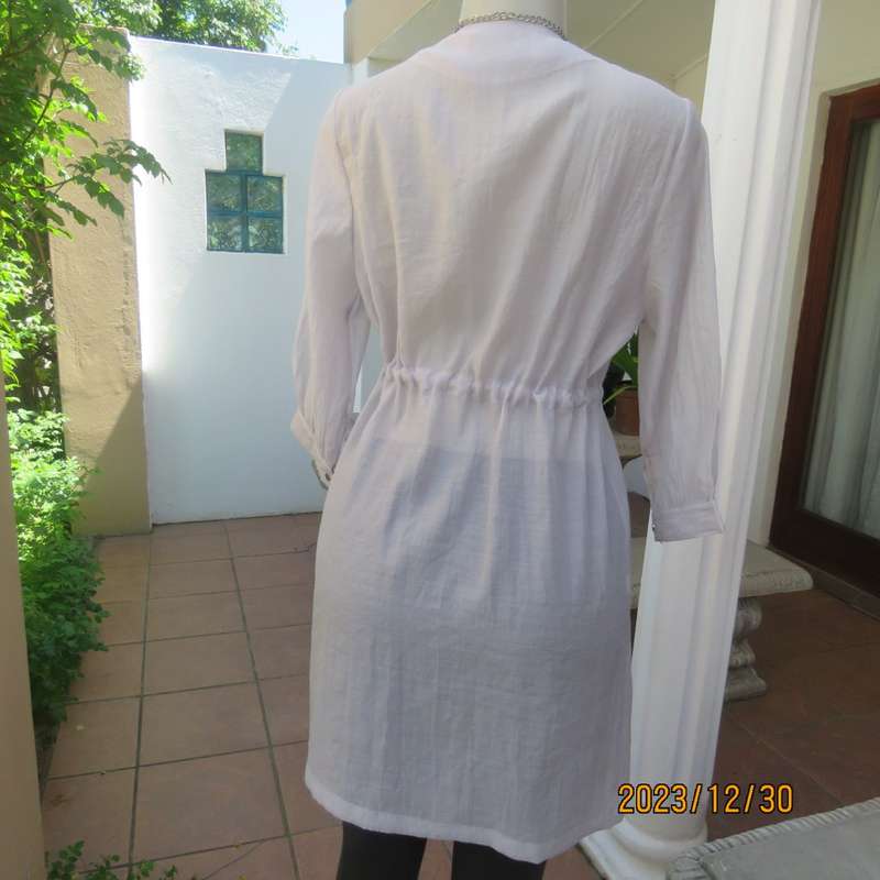 Smart long creased poly/nylon silvergrey zip up top with waist drawstring.From Japan size 36.New con