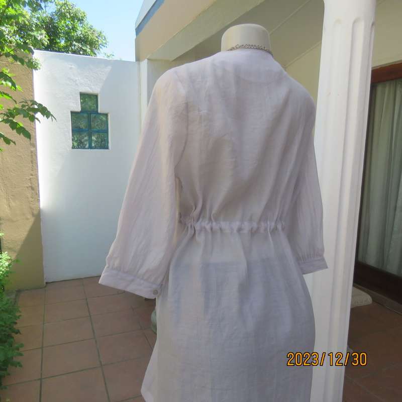 Smart long creased poly/nylon silvergrey zip up top with waist drawstring.From Japan size 36.New con