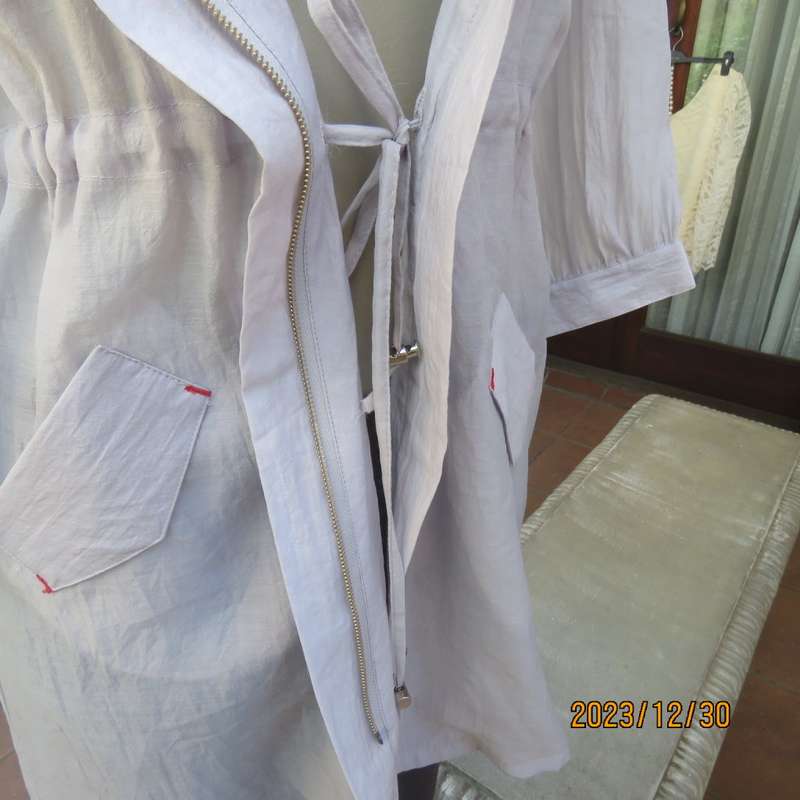 Smart long creased poly/nylon silvergrey zip up top with waist drawstring.From Japan size 36.New con