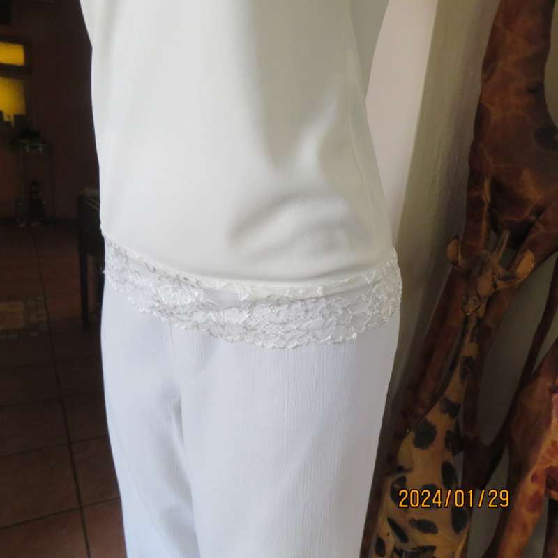 TRUWORHS size 34 light cream scooped neckline sleeveless top in stretch polyester.