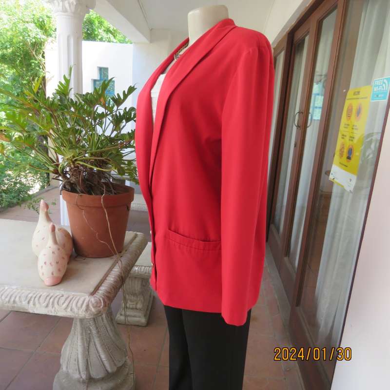 Get noticed in this carmine red long sleeve 3 button jacket with shawl collar.Size 38 to 40. As new
