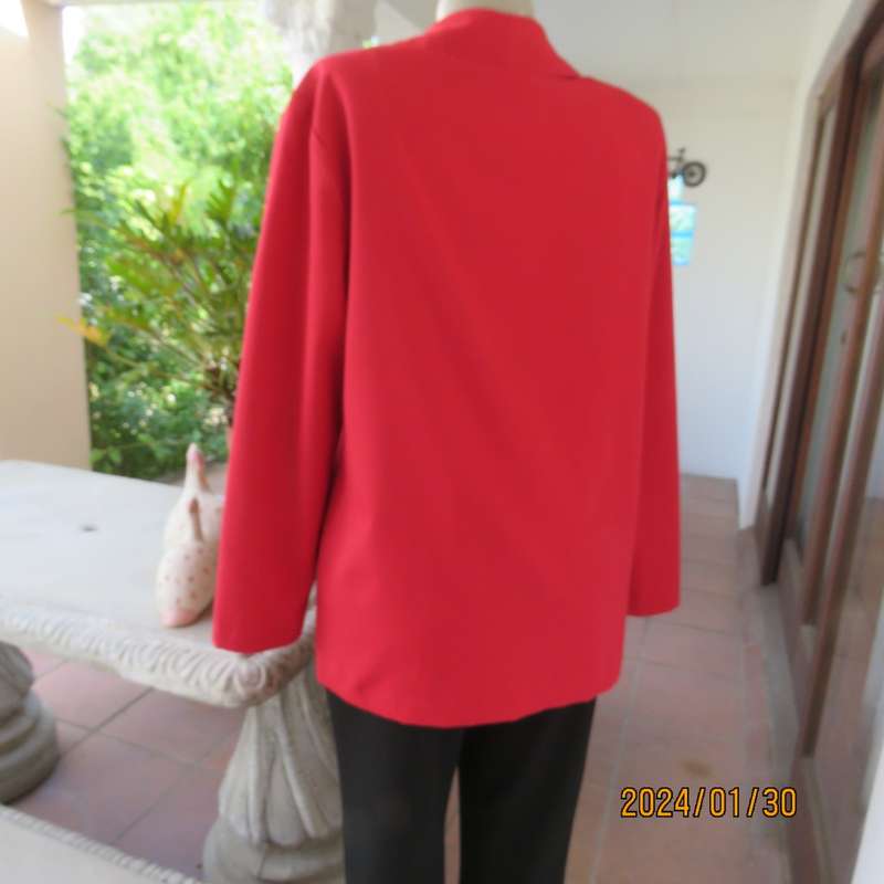 Get noticed in this carmine red long sleeve 3 button jacket with shawl collar.Size 38 to 40. As new
