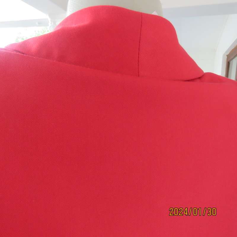 Get noticed in this carmine red long sleeve 3 button jacket with shawl collar.Size 38 to 40. As new