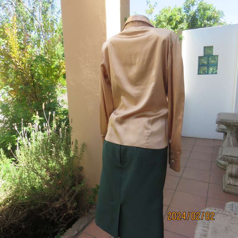 Luxury gold colour long sleeve stretch shiny polyester button down top. By TRUWORTS size 40.As new