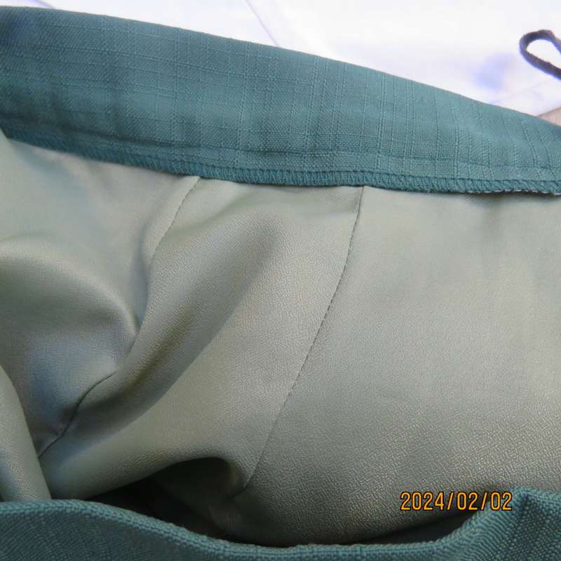 Smart dark green bottle green fully lined pencil size 36 skirt. With pleat and zip at back. As new.