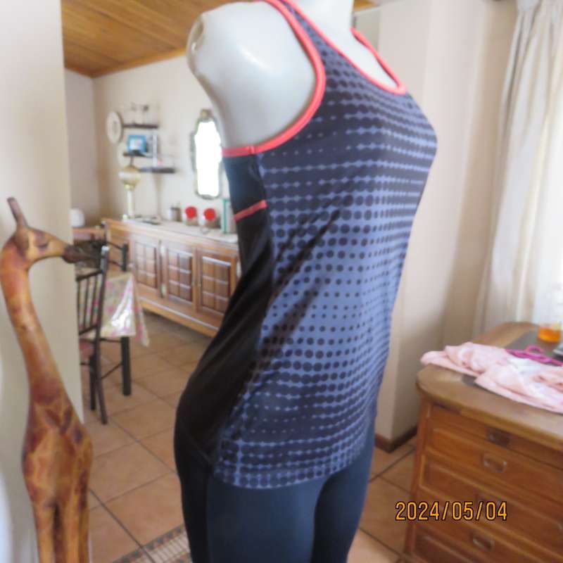 Pretty sport stretch poly sleeveless black/grey with polkadots and crimson edging .Size 32/34