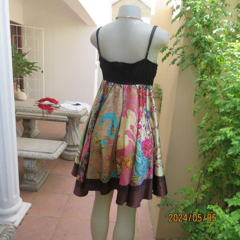 Pretty flare colourful bo-ho patterned empire dress with black strappy bodice. By JESSICA size 34/10