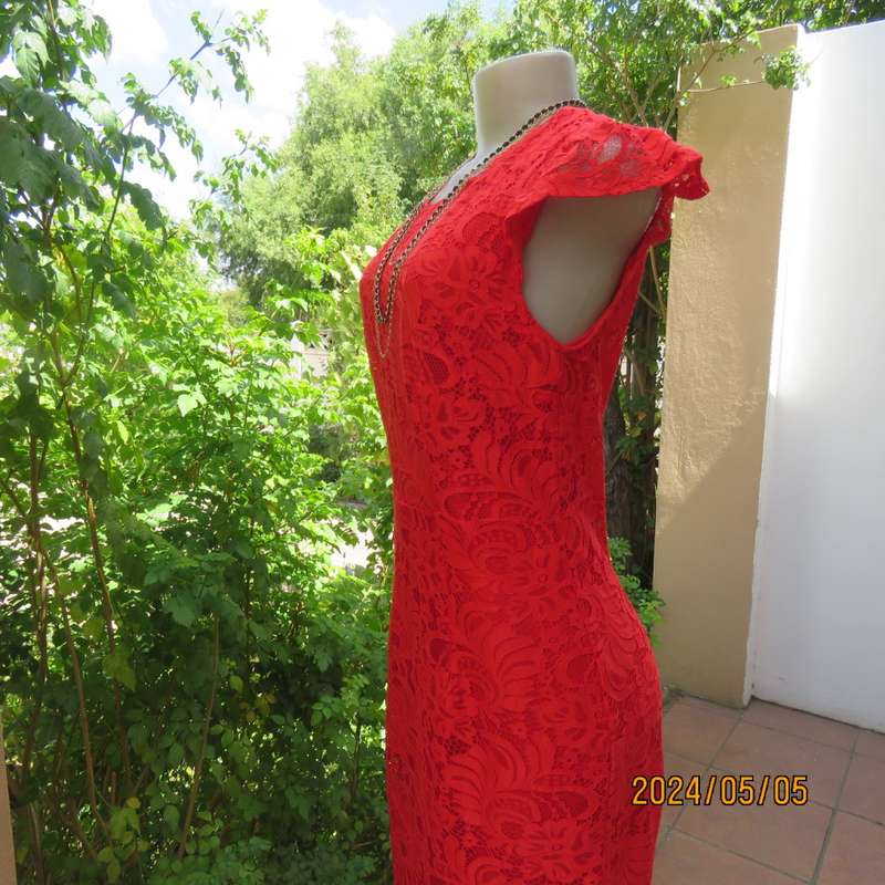 Fired up in red lace!!. Stunning red dress in stretch poly with lace. Long back zip.Tiny sleeves.34.