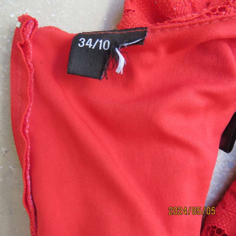 Fired up in red lace!!. Stunning red dress in stretch poly with lace. Long back zip.Tiny sleeves.34.