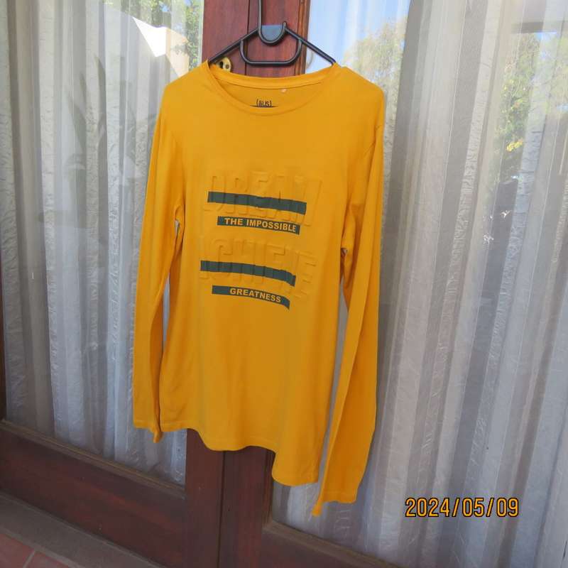 Unique mustard long sleeve 100% cotton top by (&US) size 15 to 16yr old boy. Stand out logo. New con
