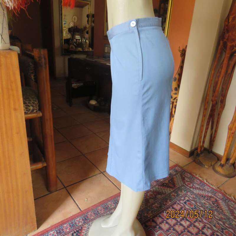 Elegant blue denim colour gored calf length skirt. Size 38. No Label. Side zip. Stretch poly.As new