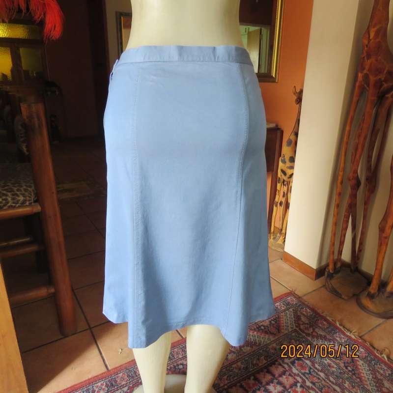 Elegant blue denim colour gored calf length skirt. Size 38. No Label. Side zip. Stretch poly.As new