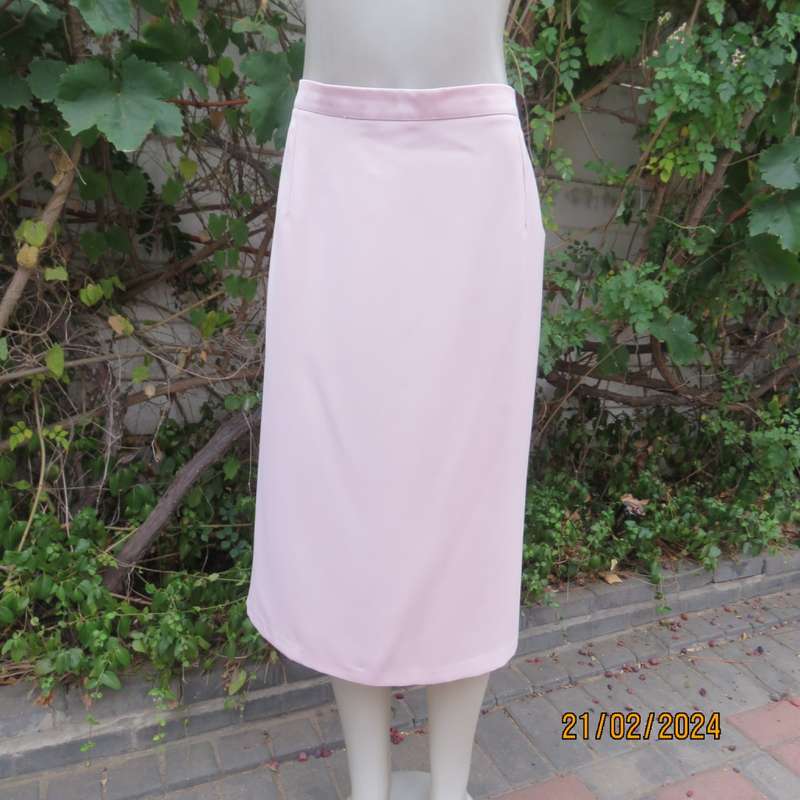 Blush pink pencil skirt size 44/20 by `Donna Claire`Elasticated waist back. Flat front. As new.