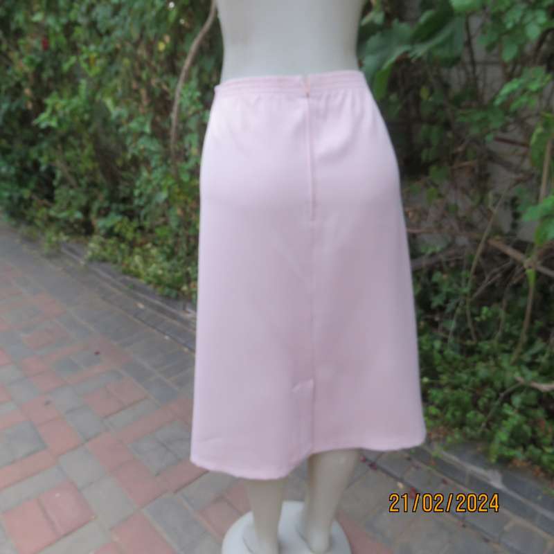Blush pink pencil skirt size 44/20 by `Donna Claire`Elasticated waist back. Flat front. As new.