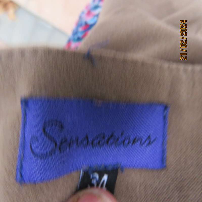 Fabulous light brown suede look 100% stretch polyester ankle length trumpet skirt.Size 36 SENSATIONS