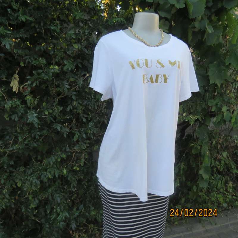 Cute white maternity T Shirt with short sleeves. Logo...YOU AND ME BABY...in gold. Size 40. As new