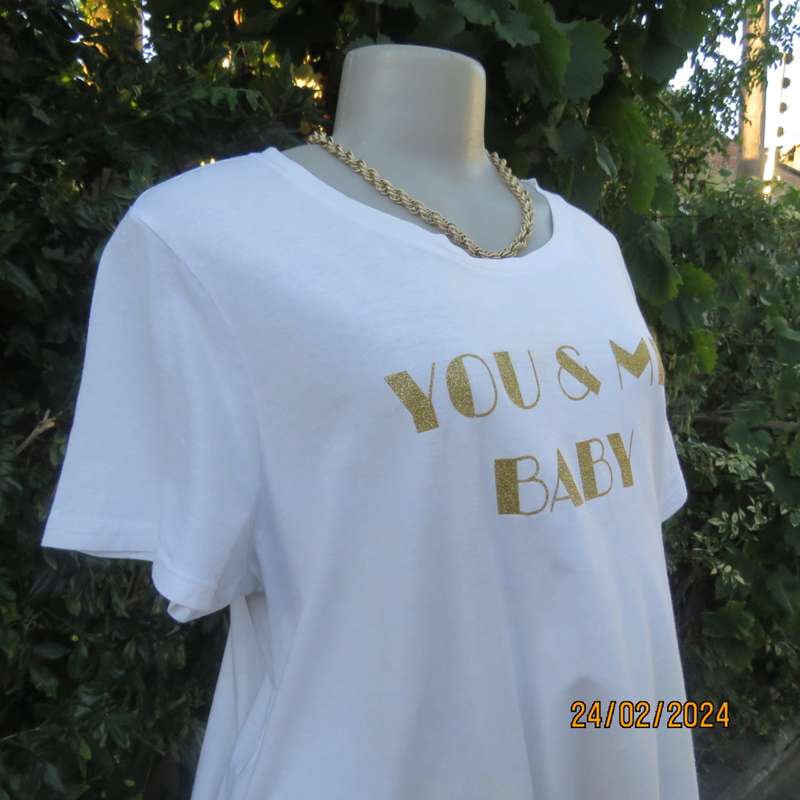 Cute white maternity T Shirt with short sleeves. Logo...YOU AND ME BABY...in gold. Size 40. As new